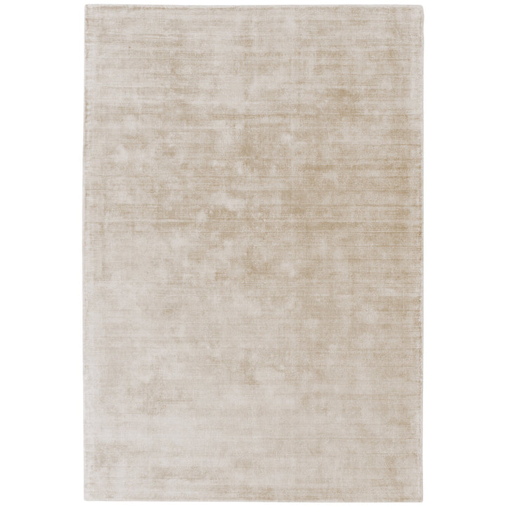 Luxury handwoven viscose rug, in a light putty colour, with a tip sheared finish giving a vintage effect. Size - Extra Large   Pile Height: 7mm   Dimensions: 2400 x 3400 mm    100% Viscose   Hand Woven in India   Delivery: 5-7 days