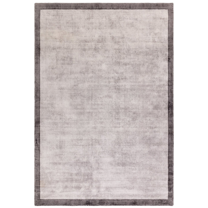 Luxury handwoven viscose rug, in silver with a narrow grey boarder, with a tip sheared finish giving a vintage effect. Size - Square Medium   Pile Height: 7mm   Dimensions: 1600 x 1600 mm  100% Viscose   Hand Woven in India  Delivery: 5-7 days