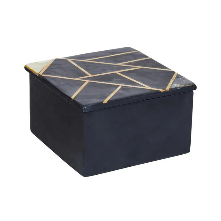 This beautiful square shape trinket box is made from black slate, and has a separate lid with a geometric design of gold inlay and mother of pearl inlay. This is the smaller of two sizes of this box. 
Dimensions: H80 x L130 x W130 mm 
Materials: Slate