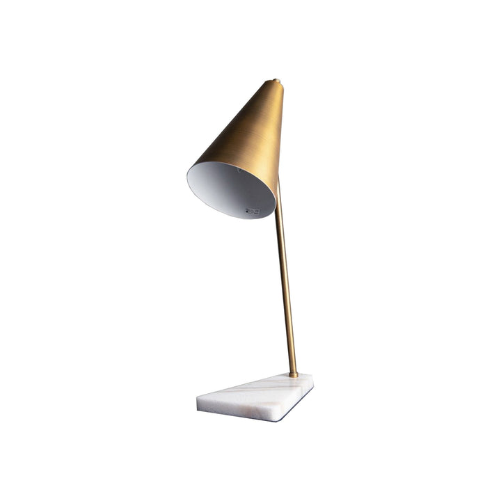 Desk lamp with brass cone shaped shade and marble base.  Its modern combination of antique brass and white marble guarantees it is a show stopper.  Dimensions: W:260 H:560 D:150 mm   Materials: Marble, Metal   Delivery: 7-10 days